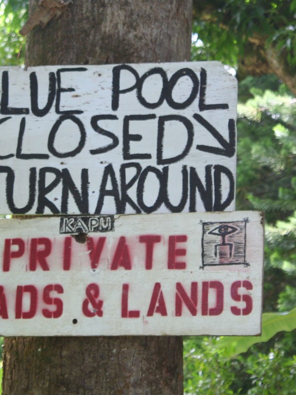 Blue pool closed signs